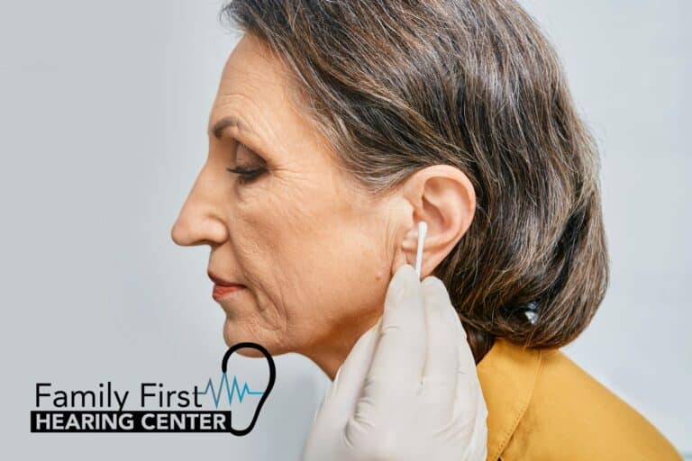 woman having her ear cleaned