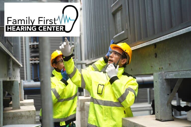 two workers in yellow protective gear